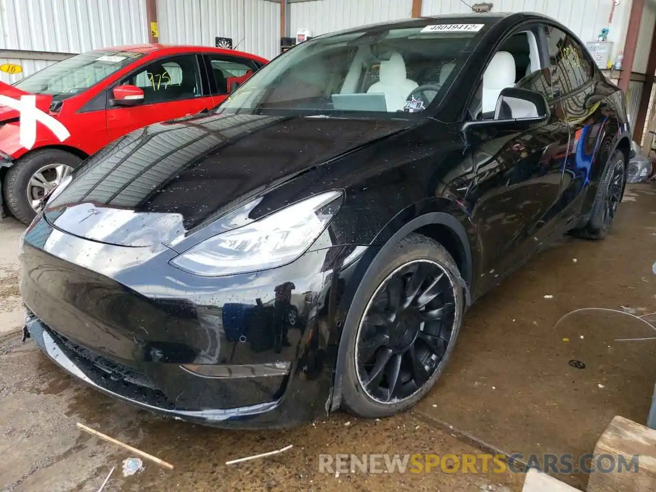 2 Photograph of a damaged car 5YJYGDEEXMF257877 TESLA MODEL Y 2021