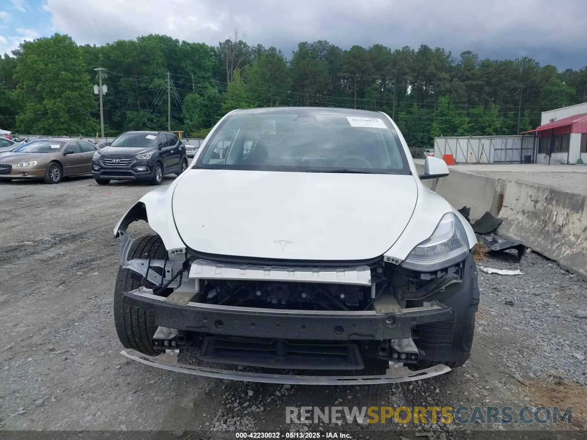 12 Photograph of a damaged car 5YJYGDEEXMF267616 TESLA MODEL Y 2021