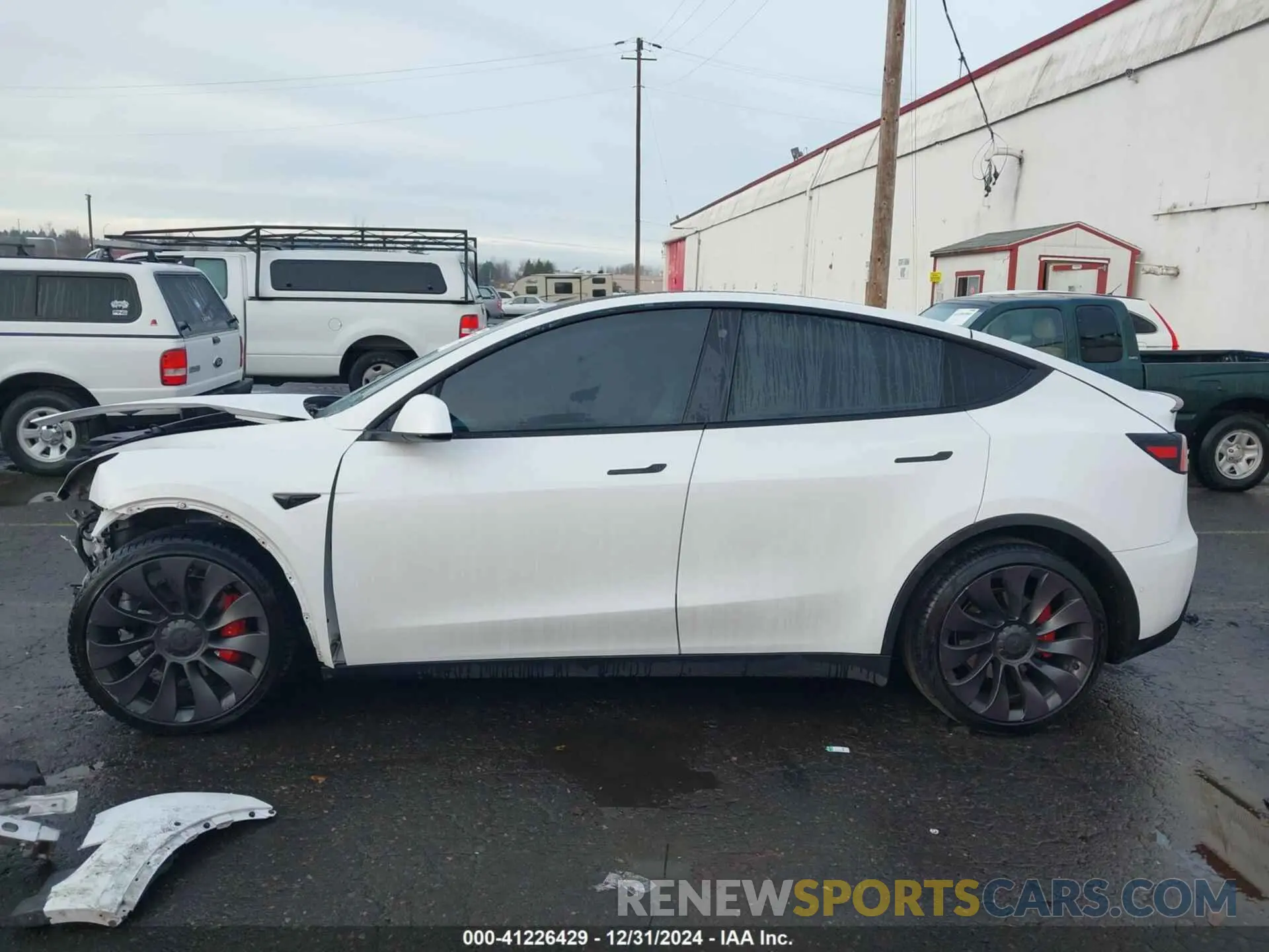 14 Photograph of a damaged car 5YJYGDEF2MF133739 TESLA MODEL Y 2021