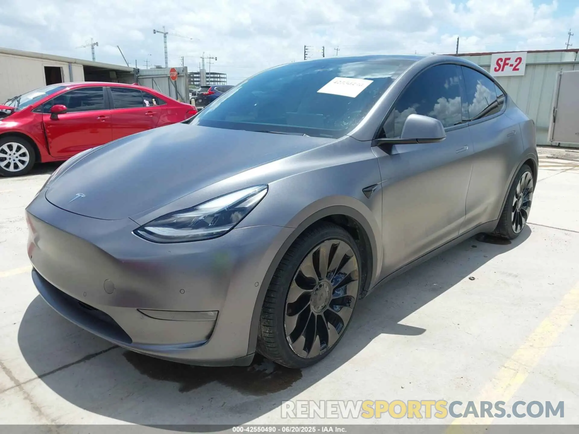 2 Photograph of a damaged car 5YJYGDEF4MF189438 TESLA MODEL Y 2021