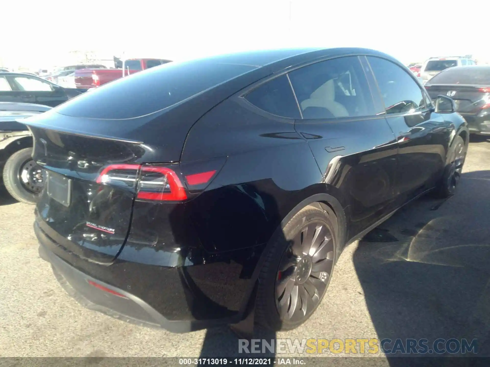 4 Photograph of a damaged car 5YJYGDEF4MF269760 TESLA MODEL Y 2021