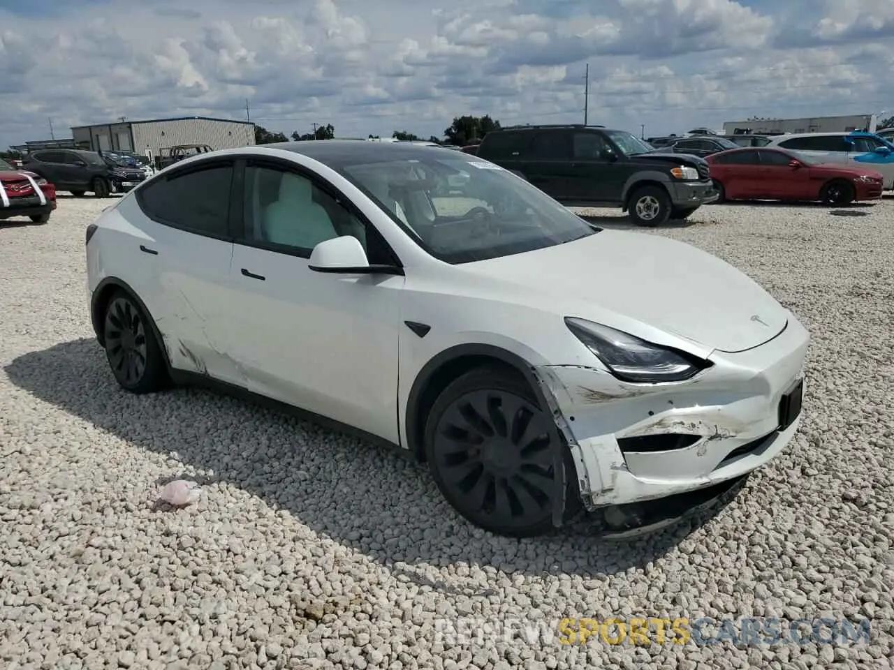 4 Photograph of a damaged car 5YJYGDEF6MF081404 TESLA MODEL Y 2021