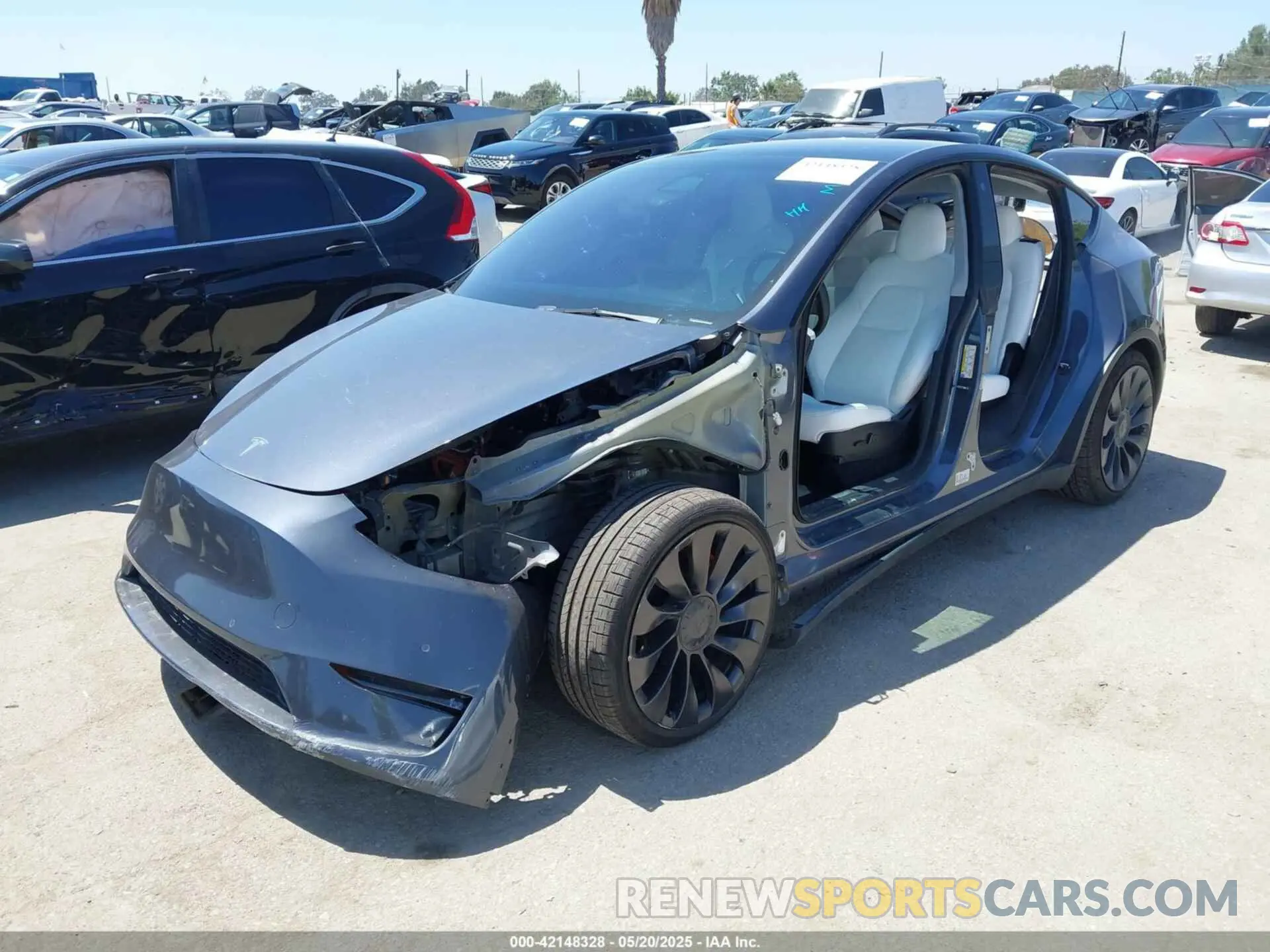 2 Photograph of a damaged car 5YJYGDEF9MF136847 TESLA MODEL Y 2021