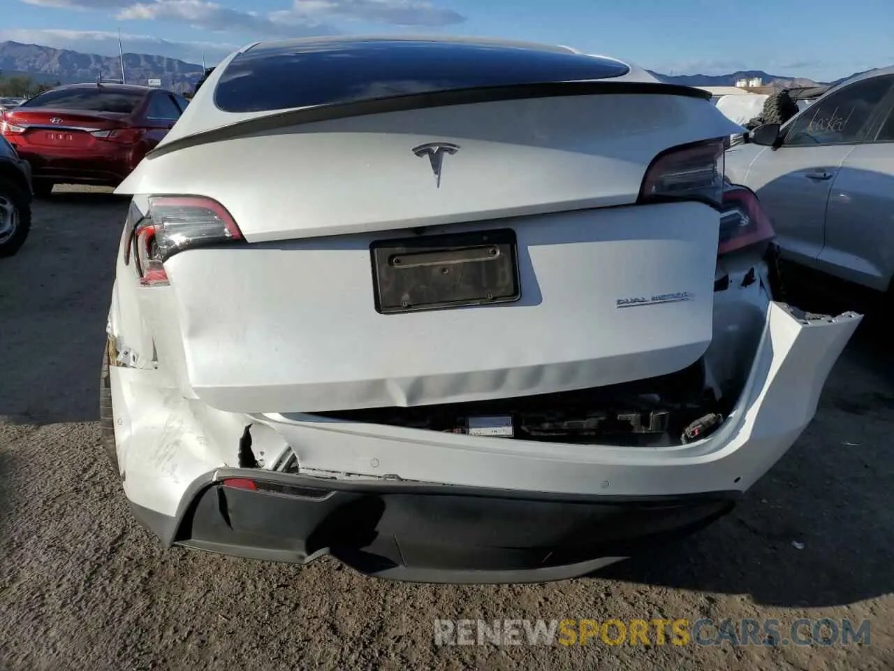 6 Photograph of a damaged car 5YJYGDEFXMF097928 TESLA MODEL Y 2021