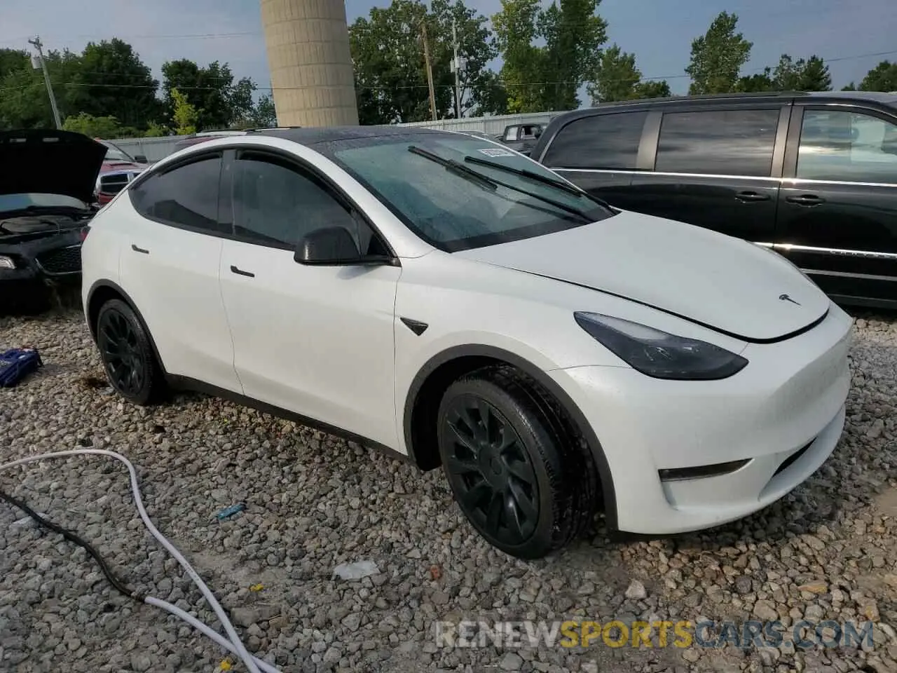 4 Photograph of a damaged car 7SAYGAEE0NF521885 TESLA MODEL Y 2022