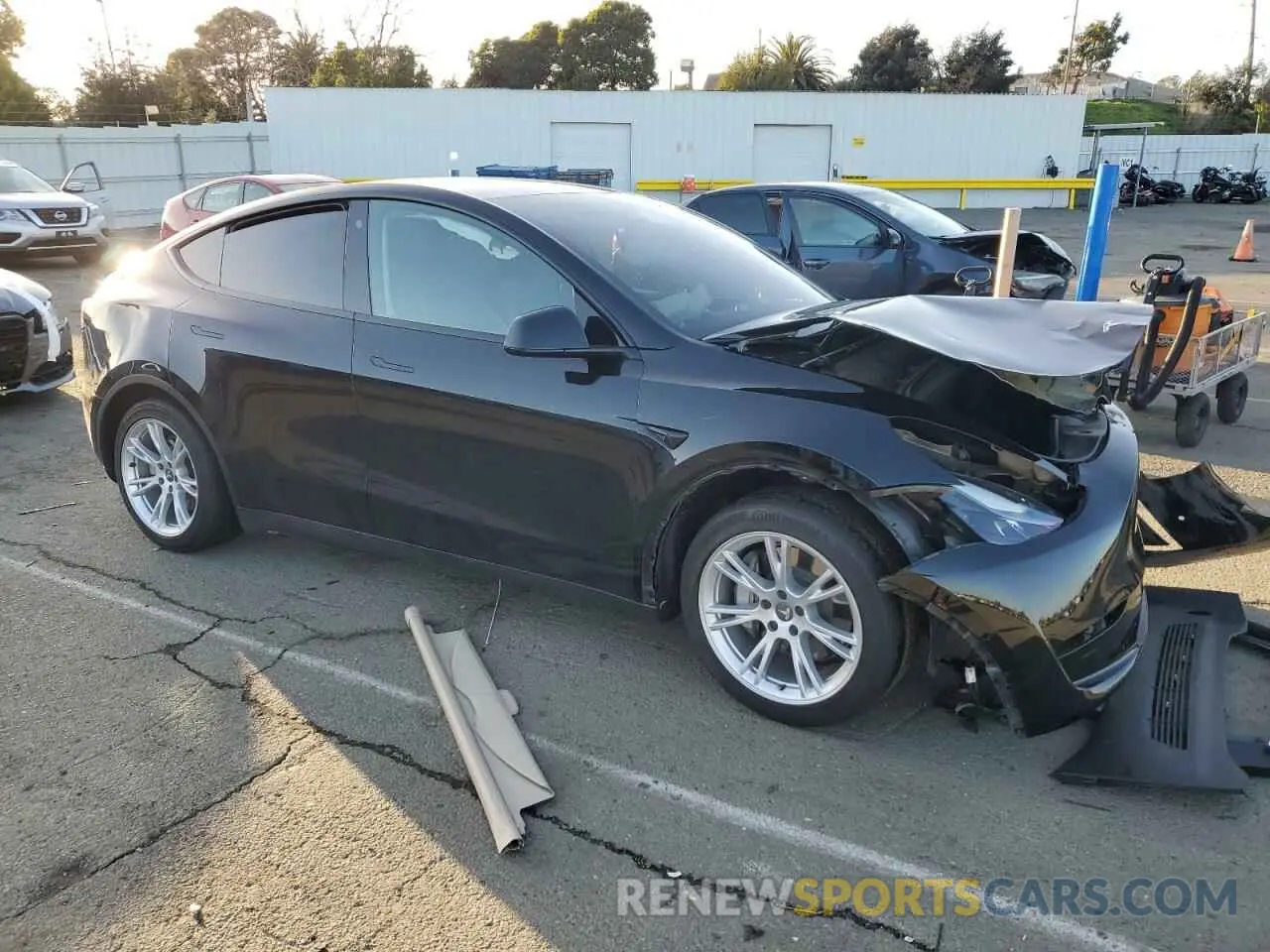 4 Photograph of a damaged car 7SAYGAEE1NF562042 TESLA MODEL Y 2022