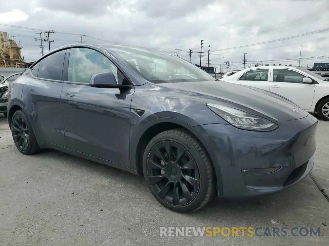 4 Photograph of a damaged car 7SAYGAEE2NF516946 TESLA MODEL Y 2022