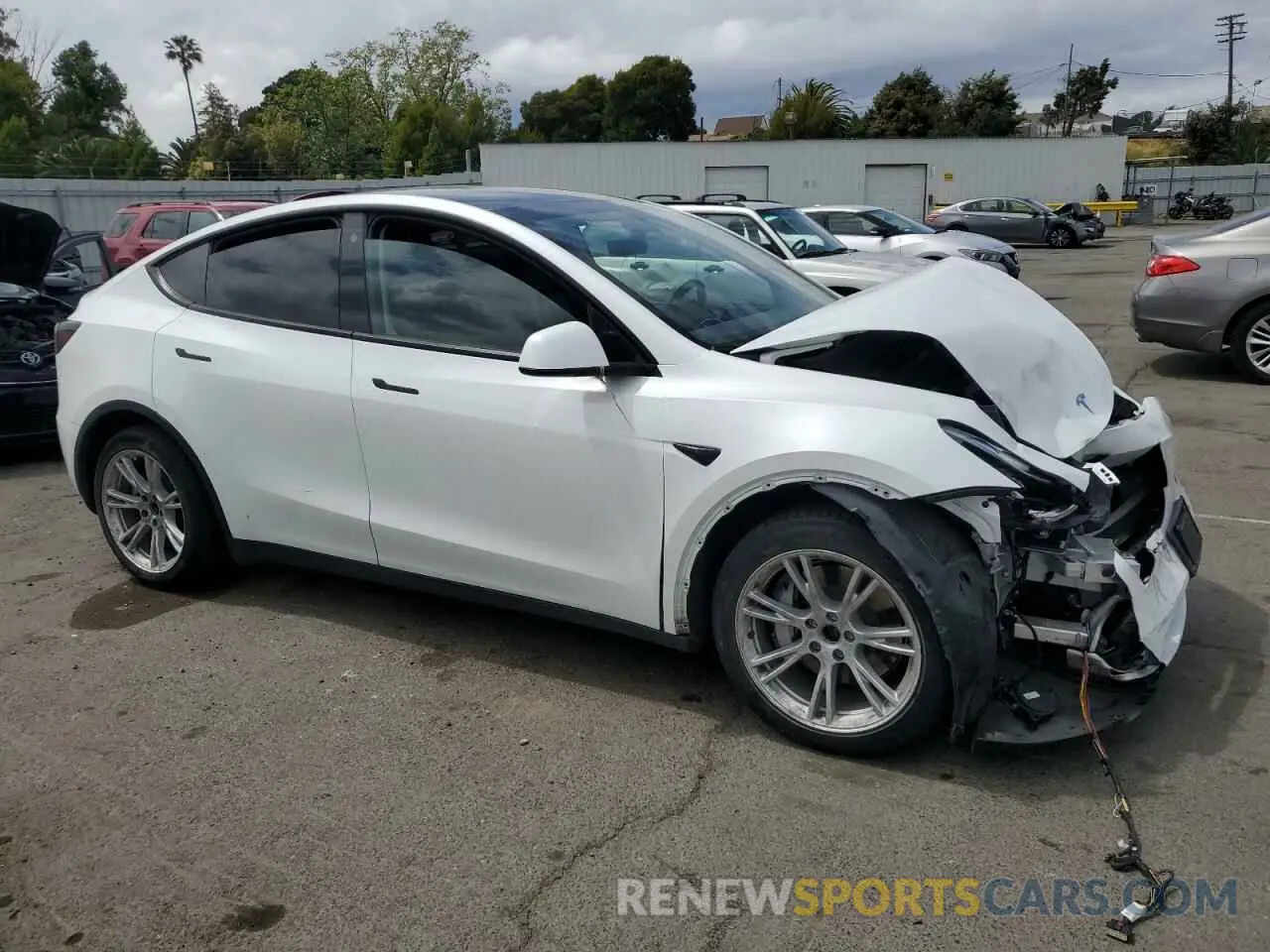 4 Photograph of a damaged car 7SAYGAEE7NF506140 TESLA MODEL Y 2022