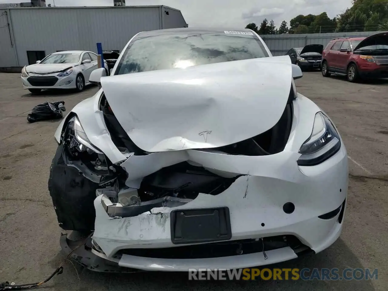 5 Photograph of a damaged car 7SAYGAEE7NF506140 TESLA MODEL Y 2022