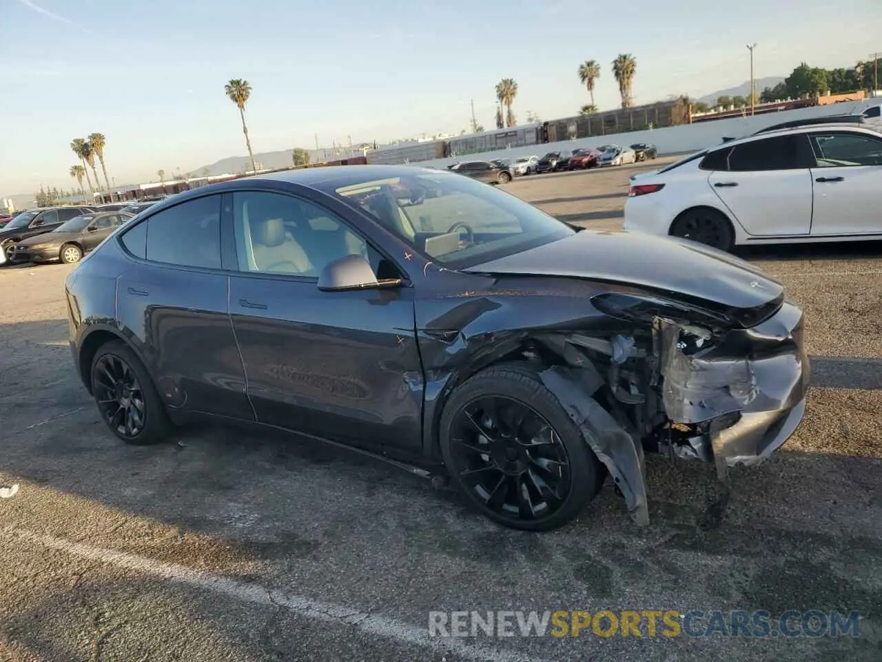 4 Photograph of a damaged car 7SAYGAEE9NF366382 TESLA MODEL Y 2022