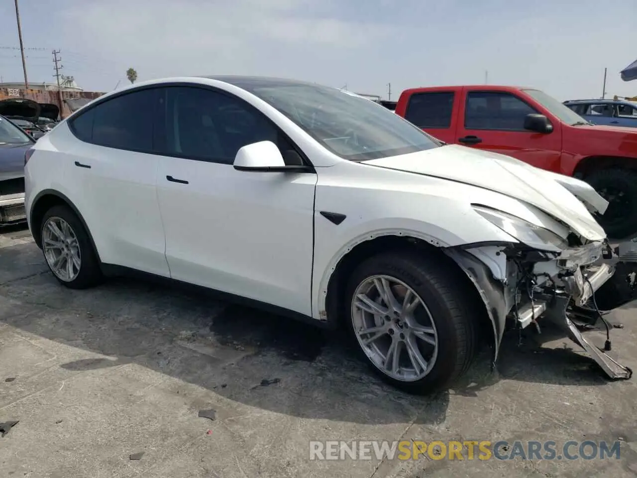 4 Photograph of a damaged car 7SAYGAEEXNF489673 TESLA MODEL Y 2022
