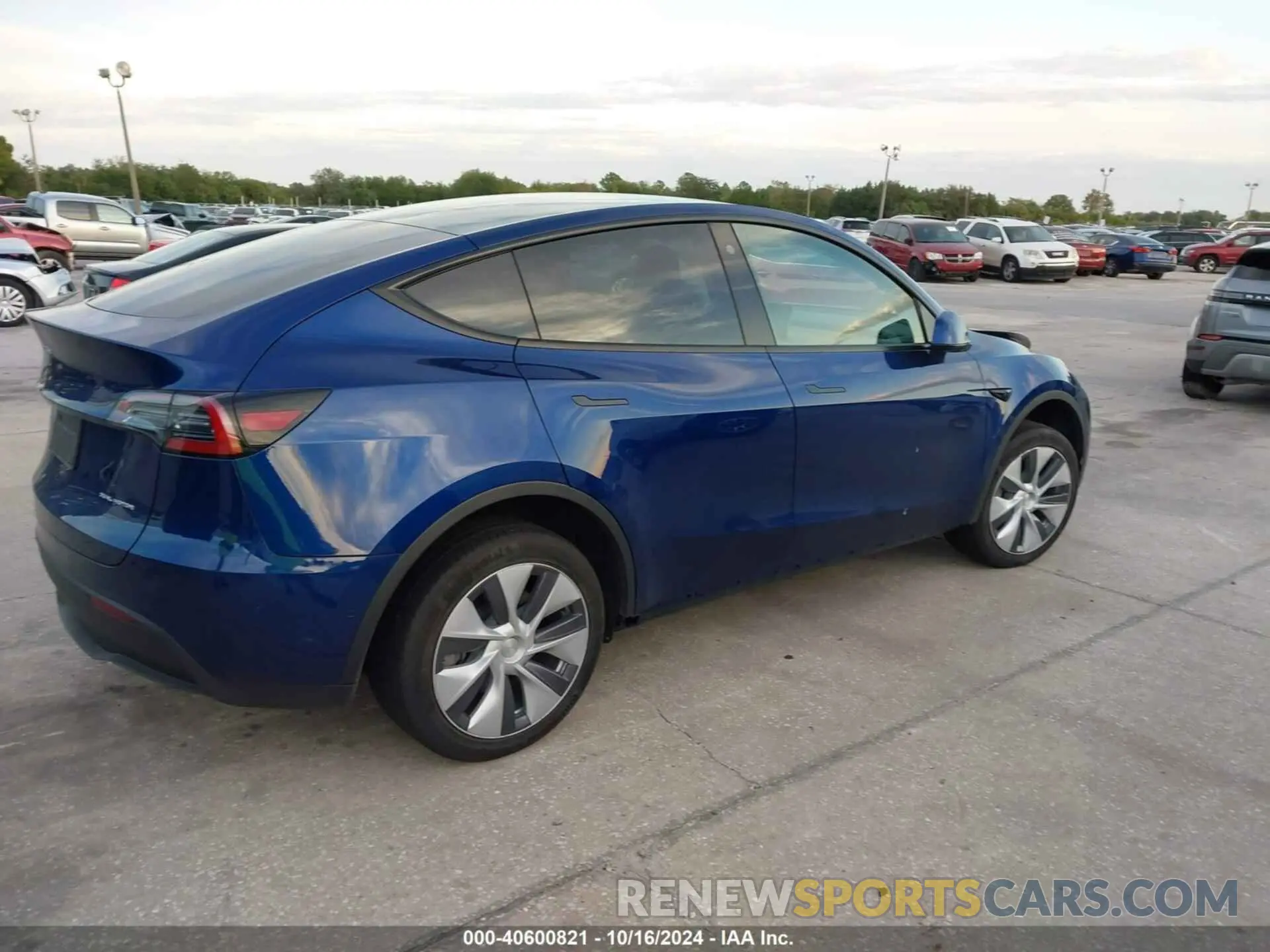 4 Photograph of a damaged car 7SAYGDEE0NA004990 TESLA MODEL Y 2022