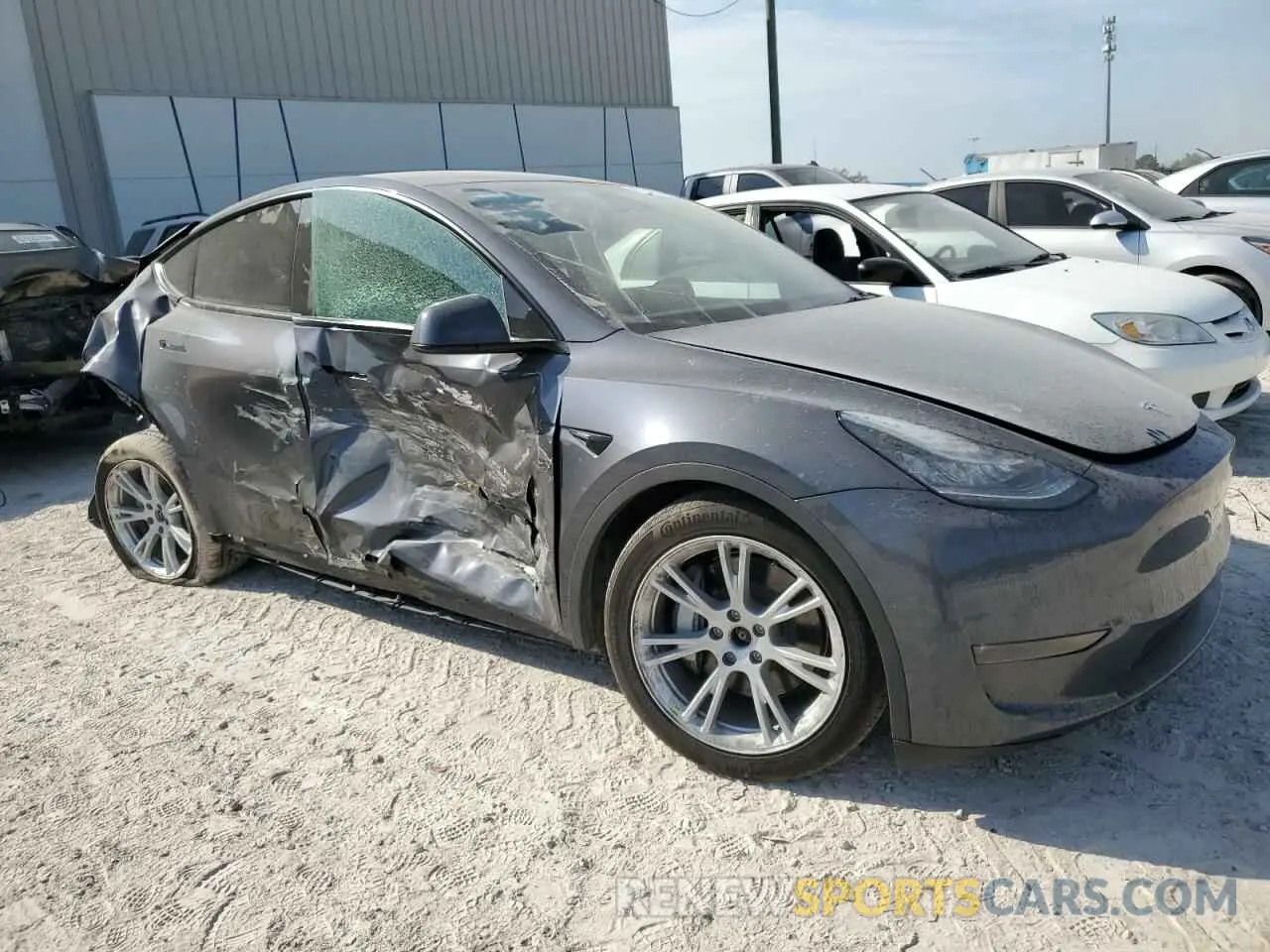 4 Photograph of a damaged car 7SAYGDEE0NA005699 TESLA MODEL Y 2022