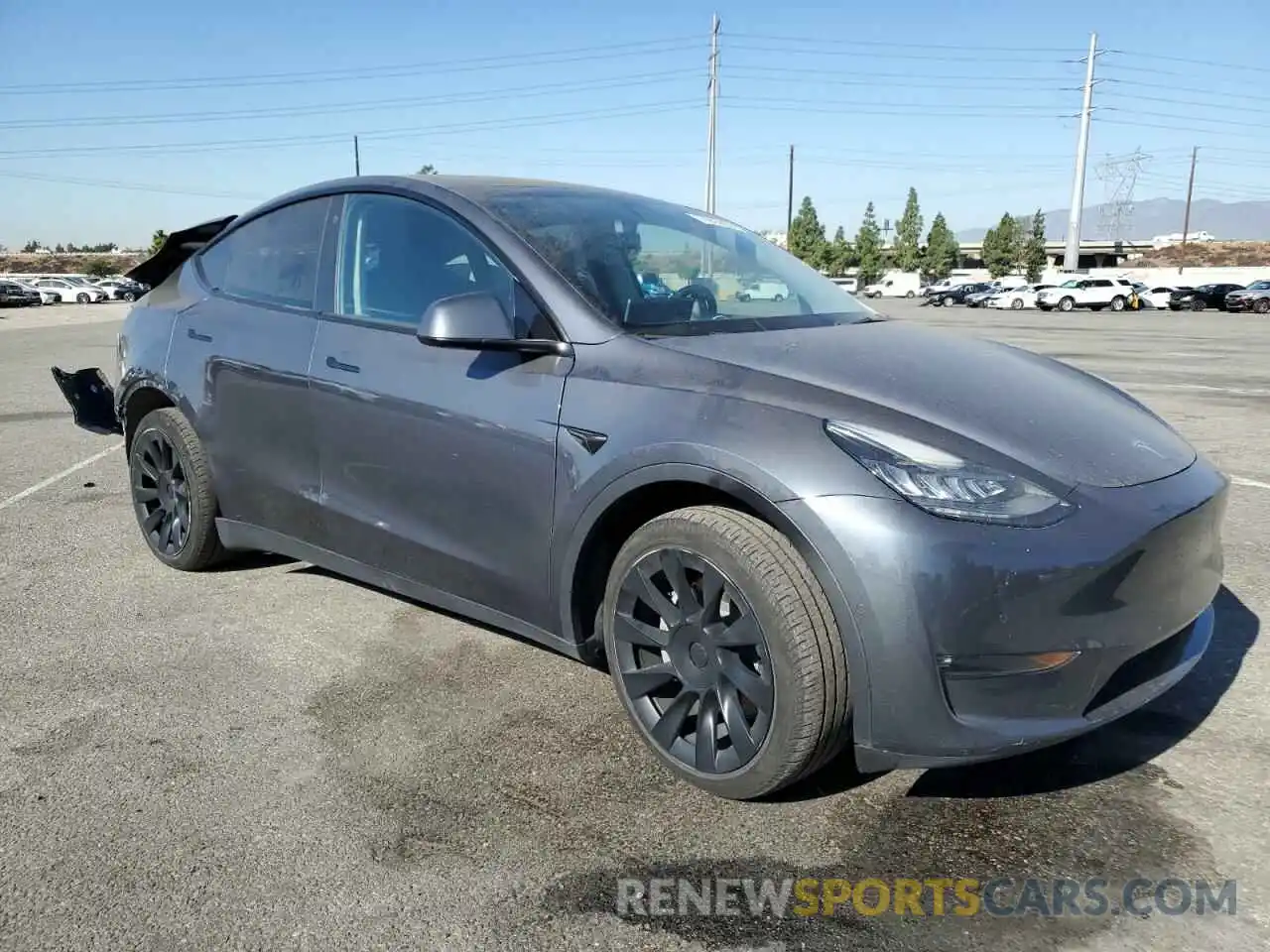 4 Photograph of a damaged car 7SAYGDEE0NF423232 TESLA MODEL Y 2022