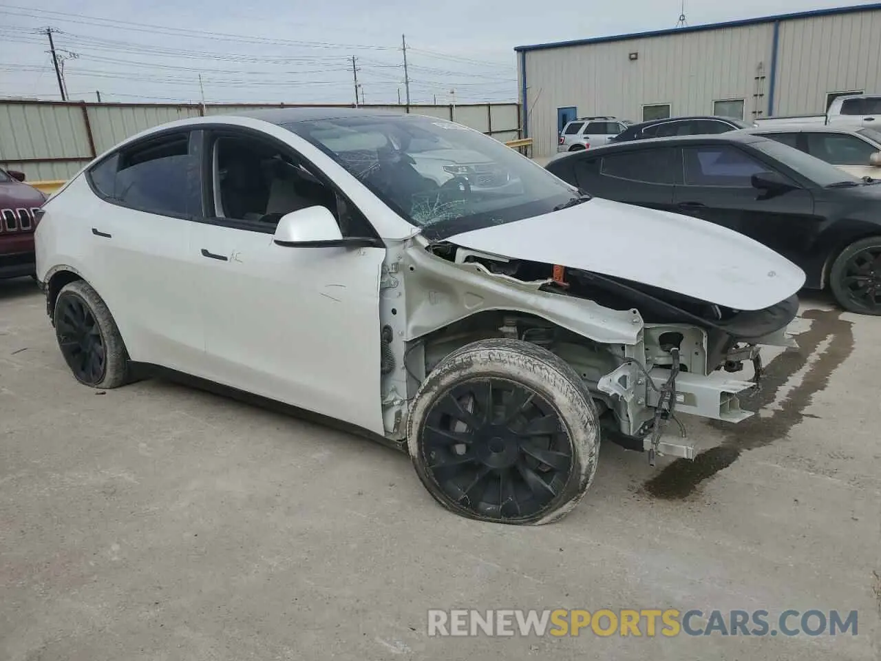 4 Photograph of a damaged car 7SAYGDEE1NA011141 TESLA MODEL Y 2022