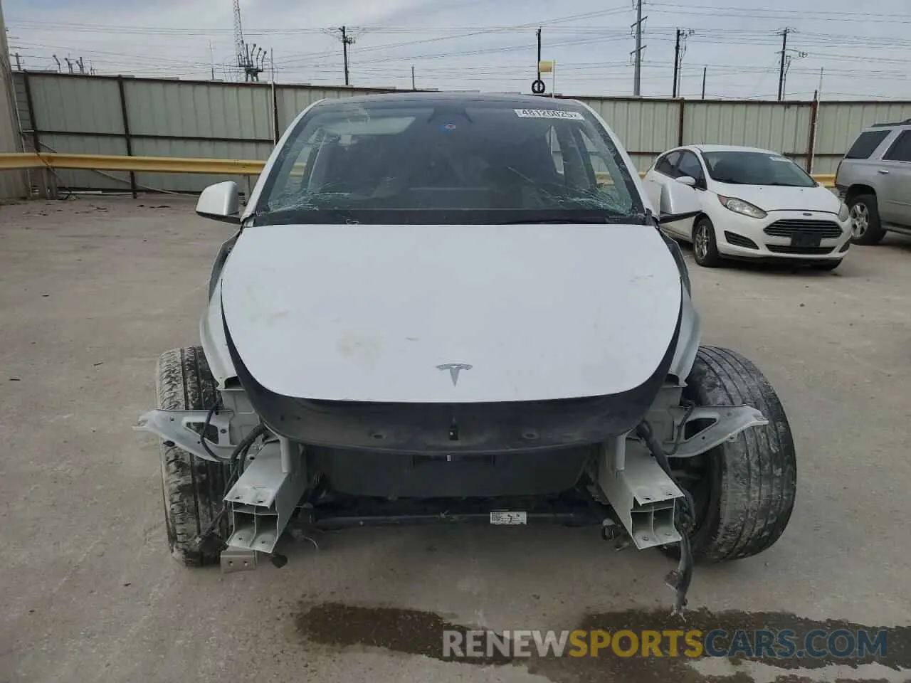 5 Photograph of a damaged car 7SAYGDEE1NA011141 TESLA MODEL Y 2022