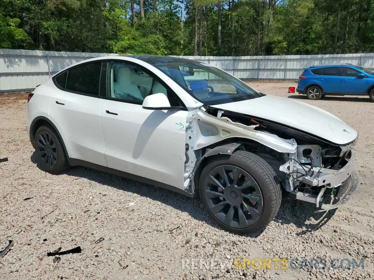 4 Photograph of a damaged car 7SAYGDEE1NF354633 TESLA MODEL Y 2022