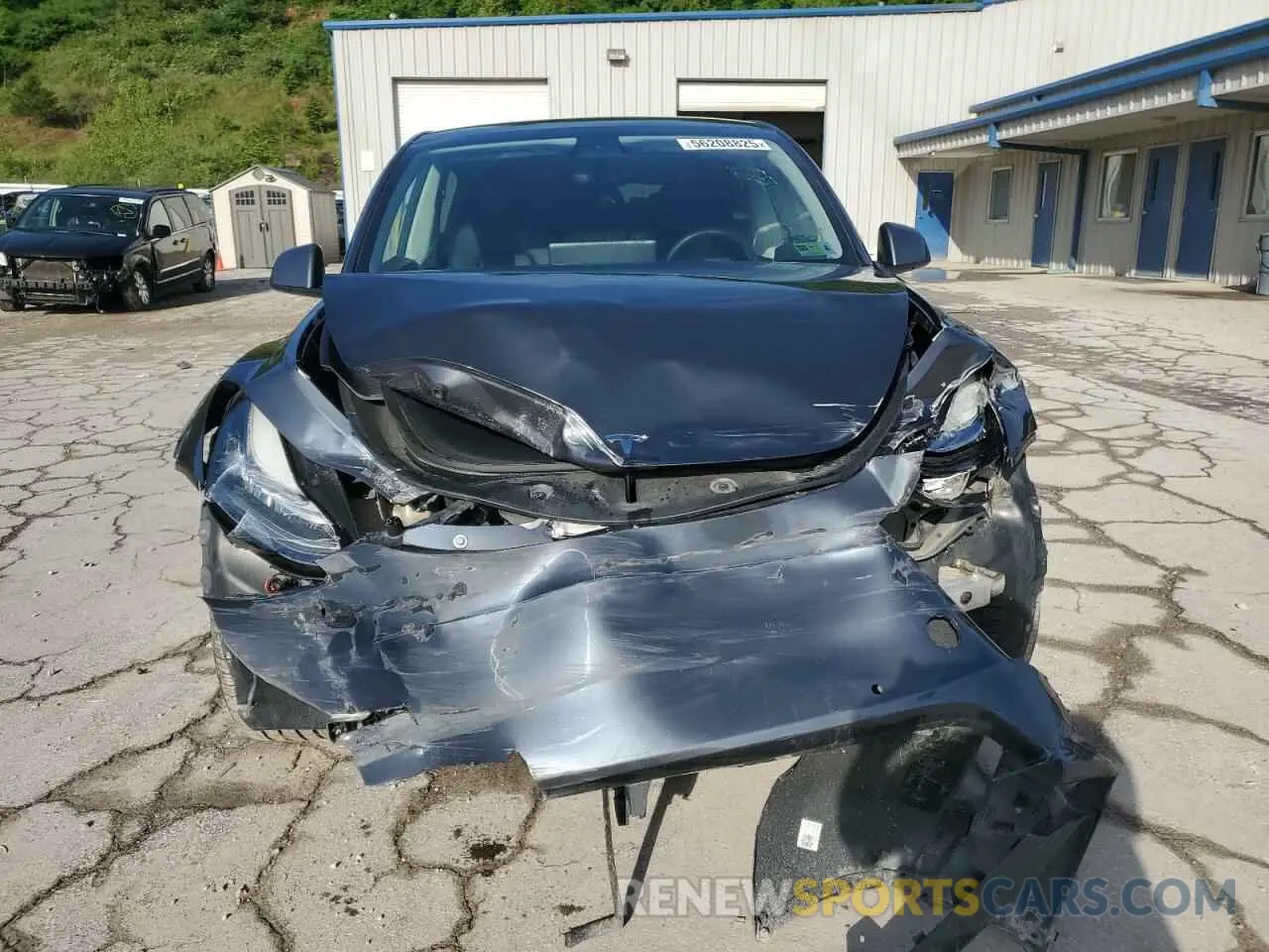 5 Photograph of a damaged car 7SAYGDEE1NF430383 TESLA MODEL Y 2022
