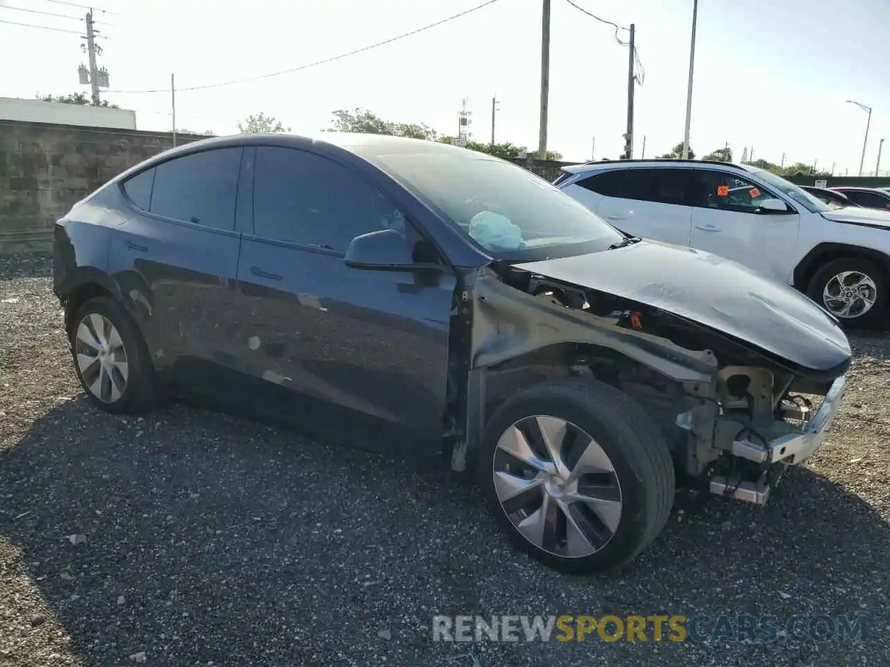 4 Photograph of a damaged car 7SAYGDEE1NF431856 TESLA MODEL Y 2022