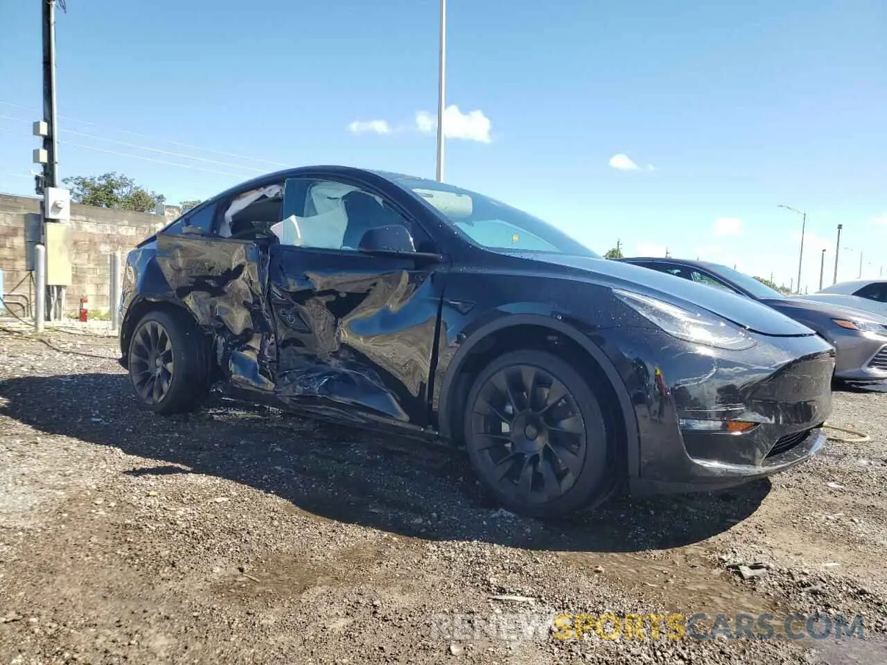 4 Photograph of a damaged car 7SAYGDEE1NF480796 TESLA MODEL Y 2022