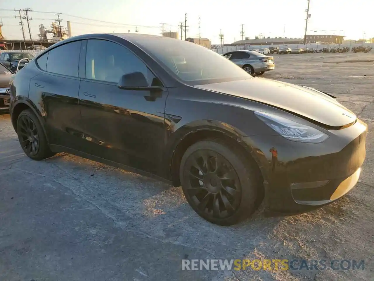 4 Photograph of a damaged car 7SAYGDEE2NA003047 TESLA MODEL Y 2022