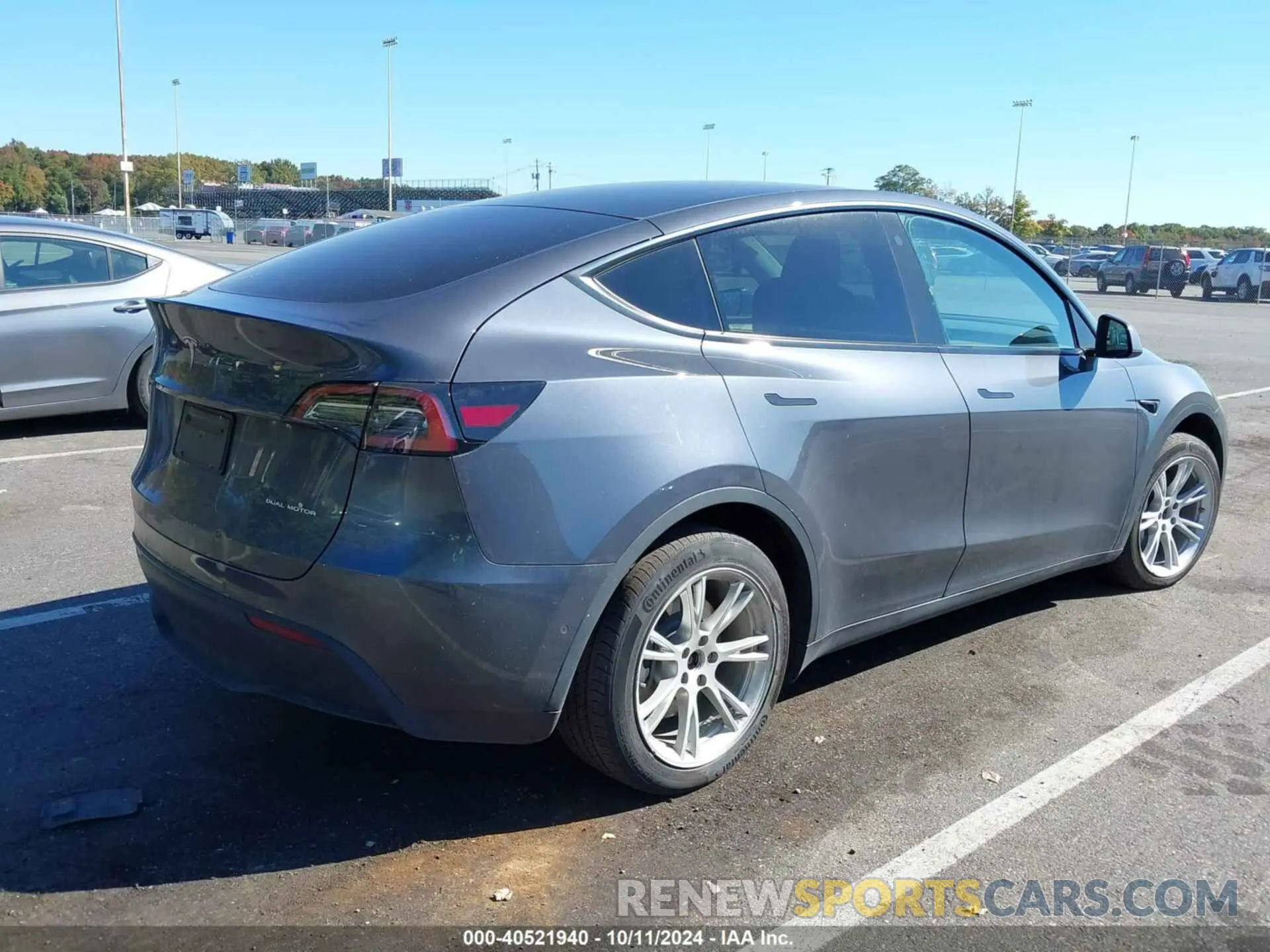 4 Photograph of a damaged car 7SAYGDEE2NA015134 TESLA MODEL Y 2022