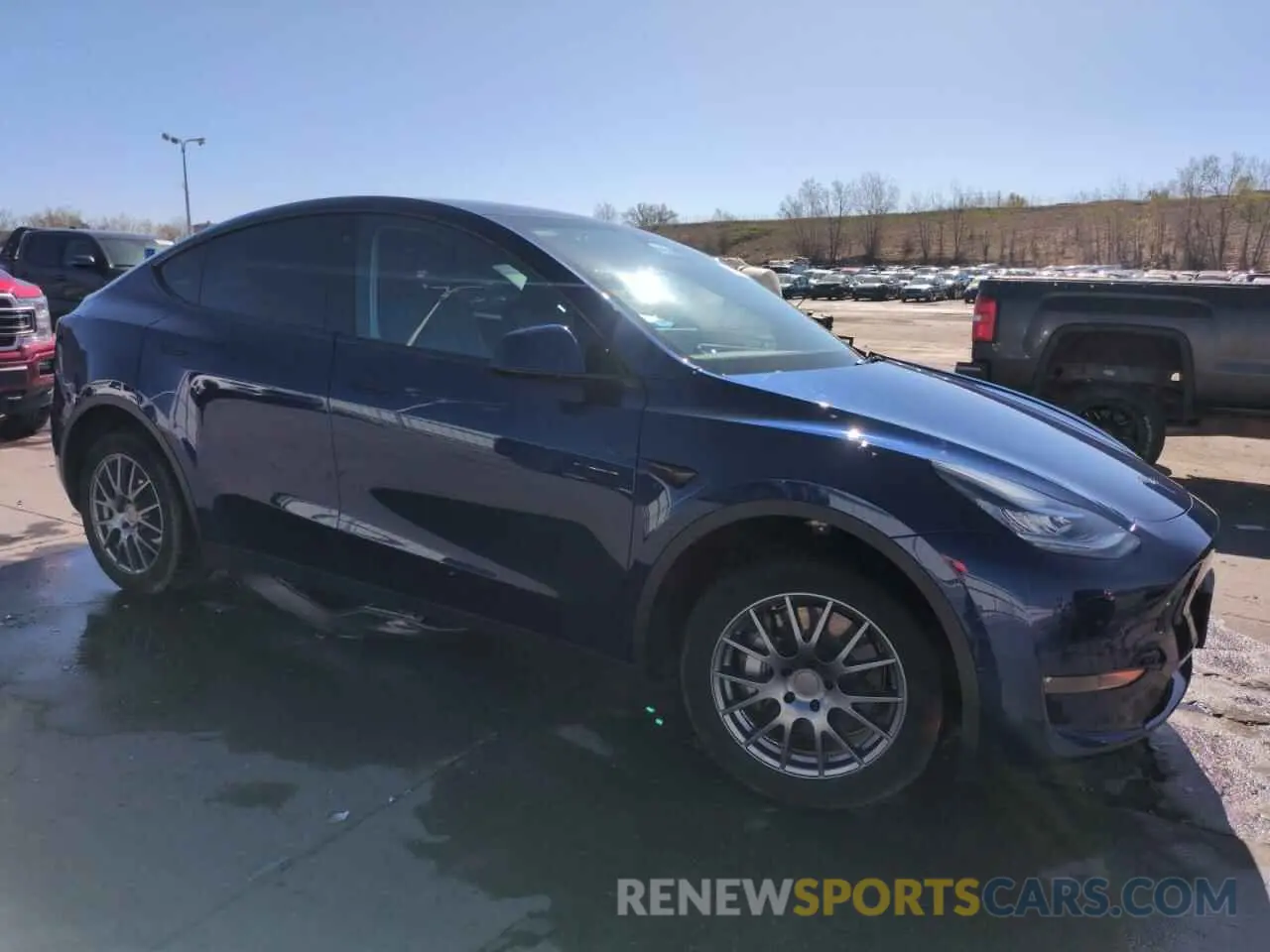 4 Photograph of a damaged car 7SAYGDEE2NA015439 TESLA MODEL Y 2022