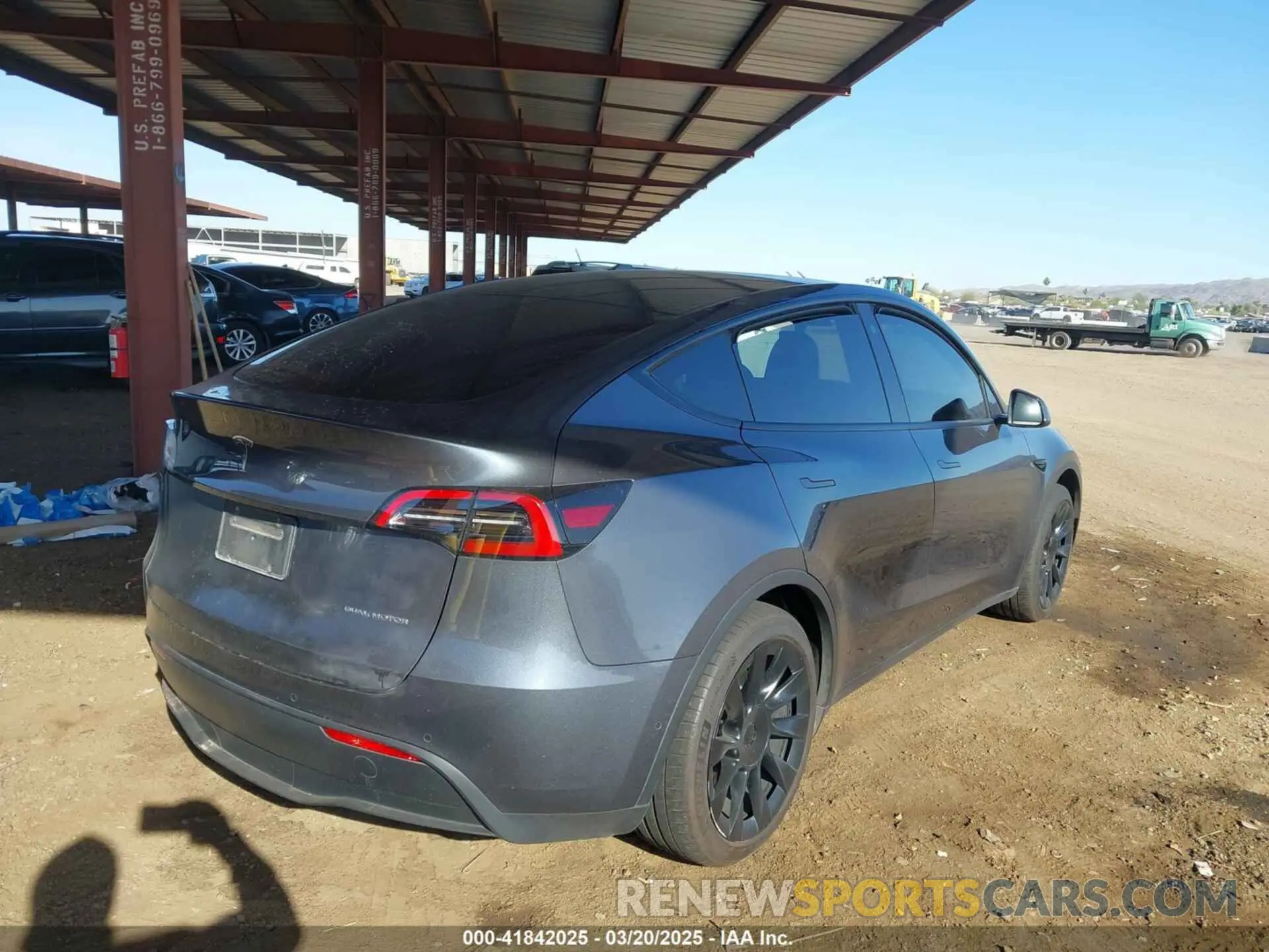 4 Photograph of a damaged car 7SAYGDEE2NA017434 TESLA MODEL Y 2022