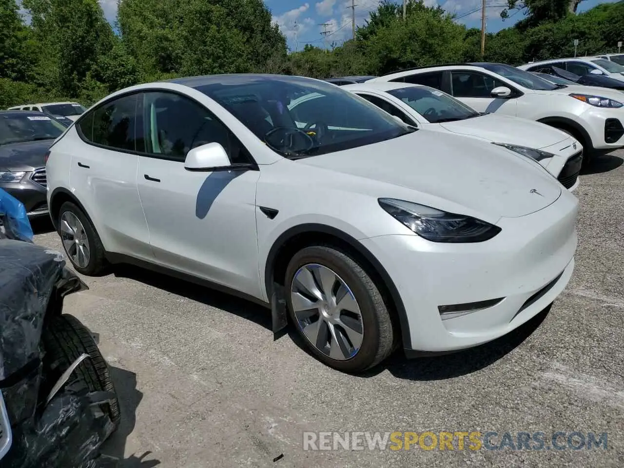 4 Photograph of a damaged car 7SAYGDEE2NF390993 TESLA MODEL Y 2022
