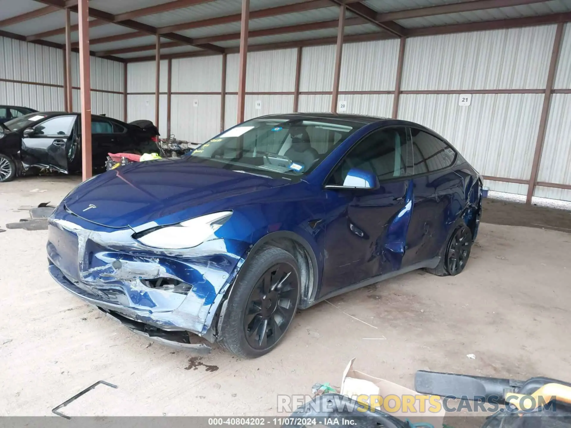2 Photograph of a damaged car 7SAYGDEE3NA001744 TESLA MODEL Y 2022
