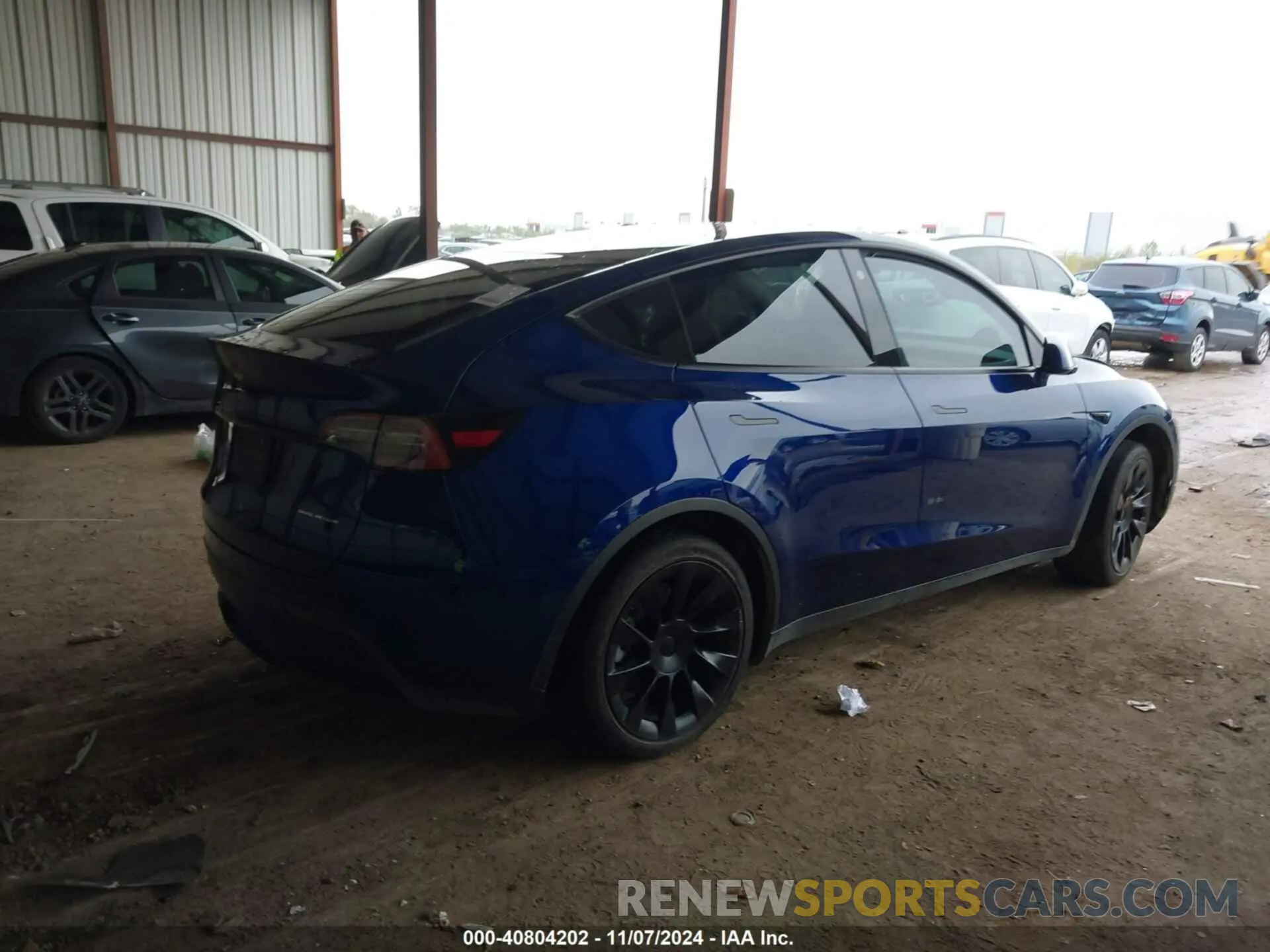 4 Photograph of a damaged car 7SAYGDEE3NA001744 TESLA MODEL Y 2022