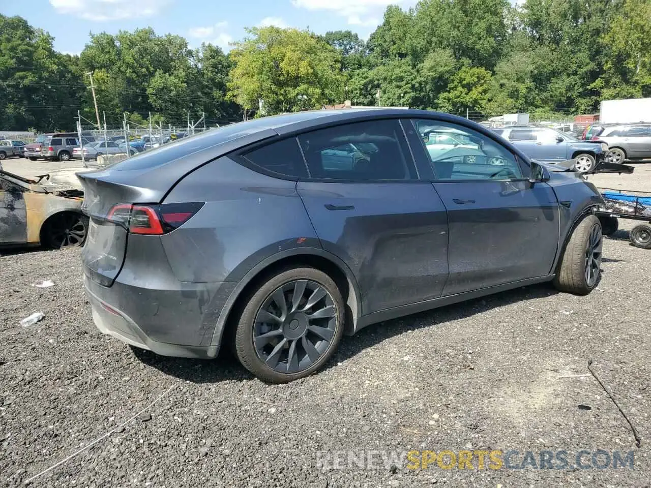 3 Photograph of a damaged car 7SAYGDEE3NA009004 TESLA MODEL Y 2022
