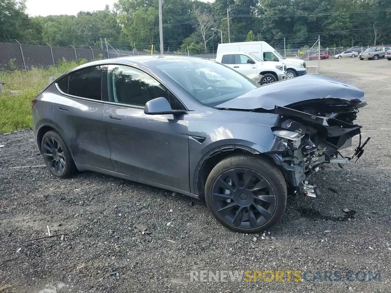 4 Photograph of a damaged car 7SAYGDEE3NA009004 TESLA MODEL Y 2022