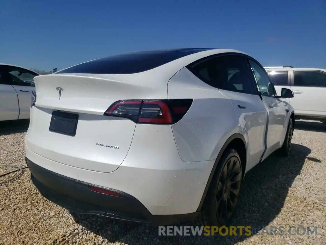 4 Photograph of a damaged car 7SAYGDEE3NF312299 TESLA MODEL Y 2022