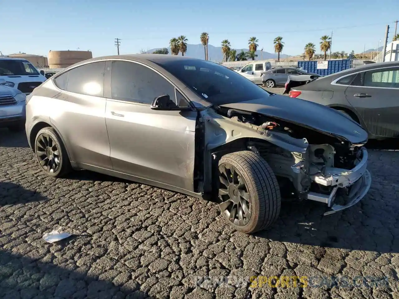 4 Photograph of a damaged car 7SAYGDEE3NF322105 TESLA MODEL Y 2022