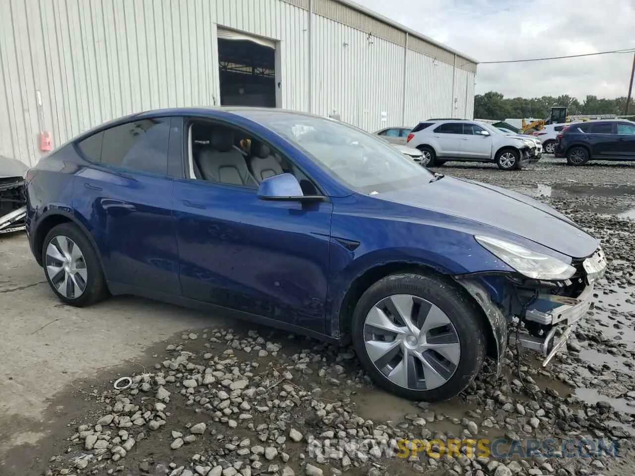 4 Photograph of a damaged car 7SAYGDEE3NF375774 TESLA MODEL Y 2022