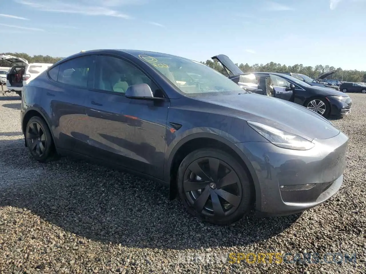 4 Photograph of a damaged car 7SAYGDEE4NF311825 TESLA MODEL Y 2022