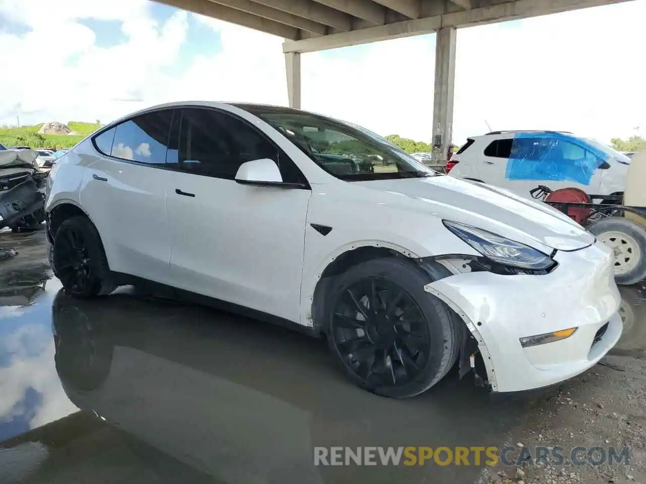 4 Photograph of a damaged car 7SAYGDEE4NF449655 TESLA MODEL Y 2022