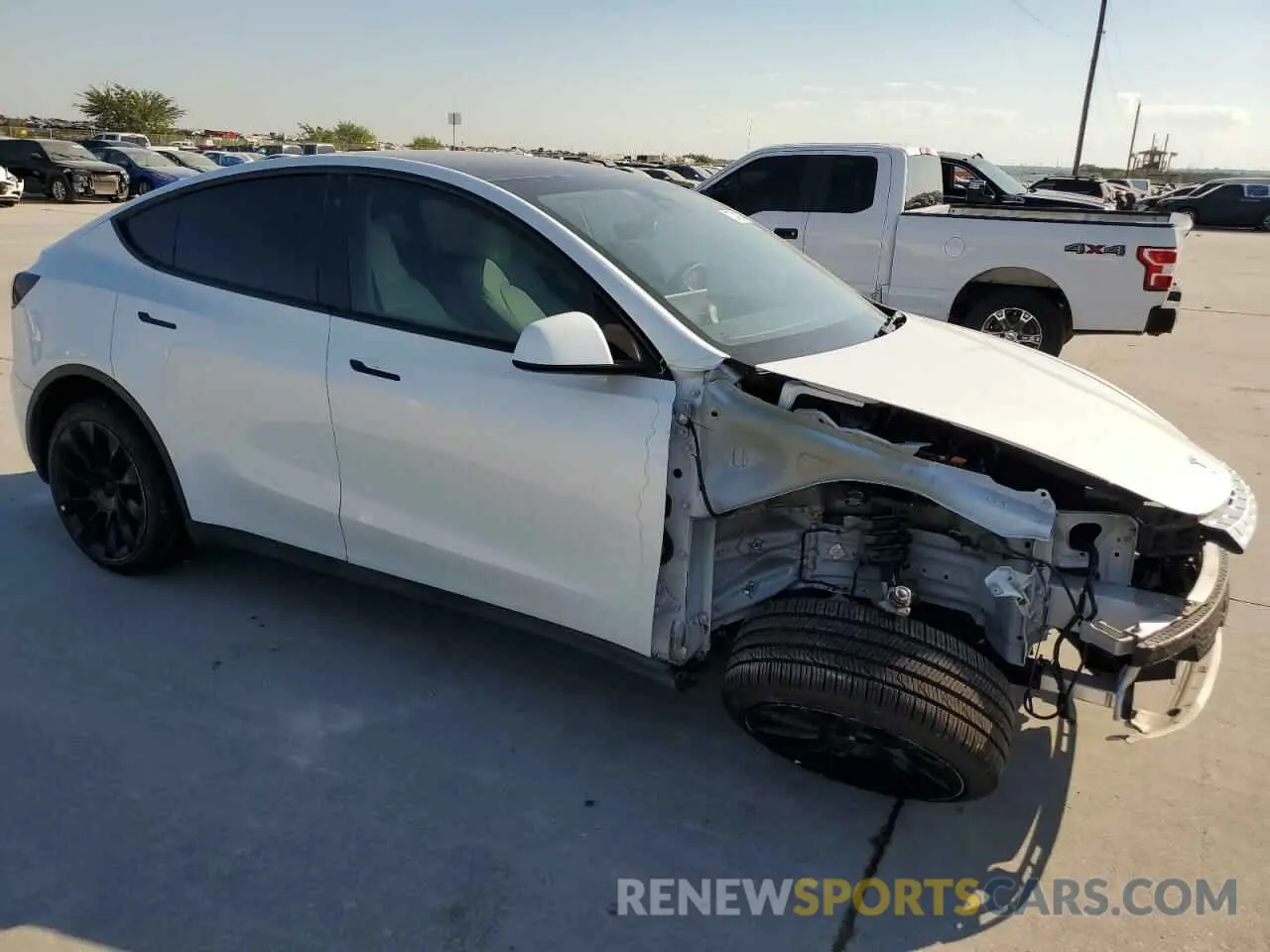4 Photograph of a damaged car 7SAYGDEE4NF514097 TESLA MODEL Y 2022