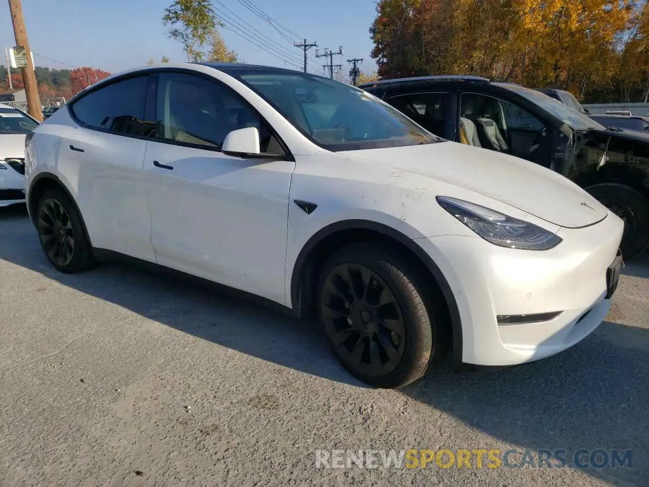 4 Photograph of a damaged car 7SAYGDEE5NA017105 TESLA MODEL Y 2022