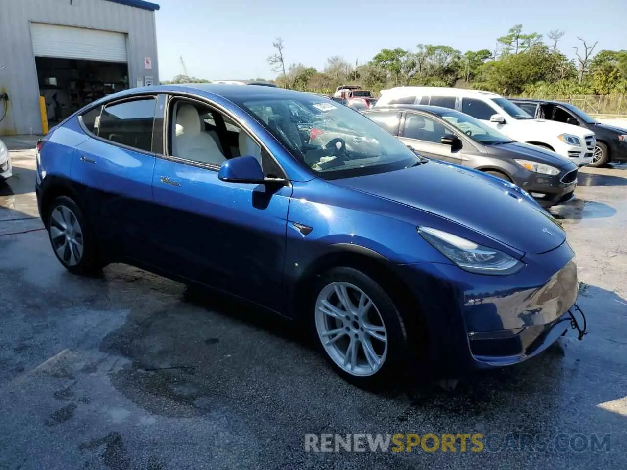 4 Photograph of a damaged car 7SAYGDEE5NF464651 TESLA MODEL Y 2022