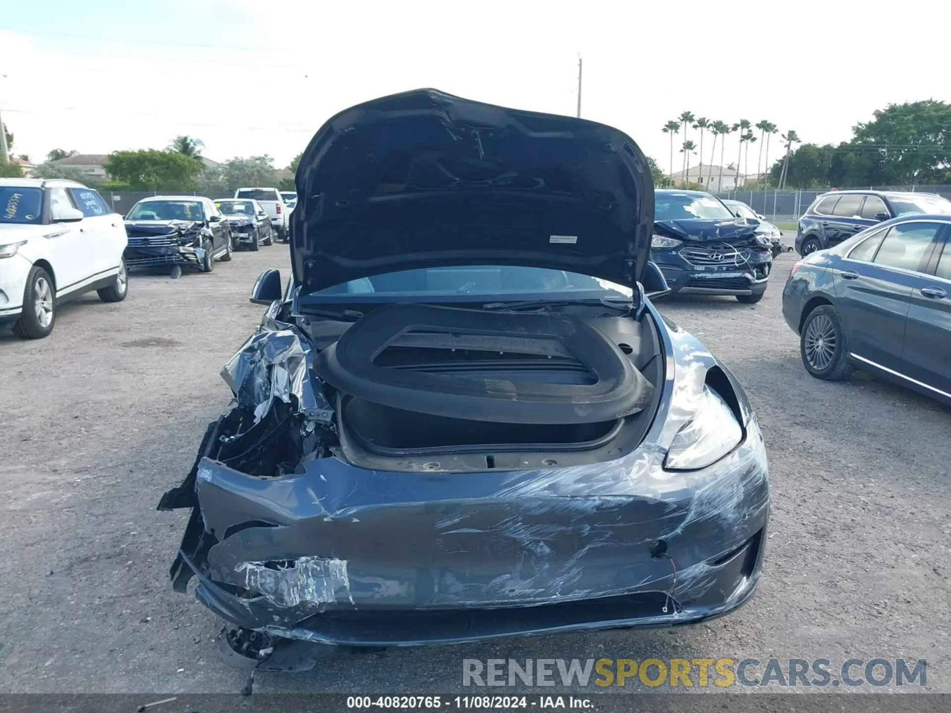 6 Photograph of a damaged car 7SAYGDEE6NA003715 TESLA MODEL Y 2022