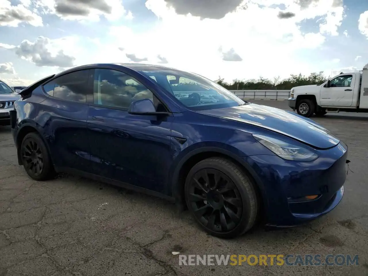 4 Photograph of a damaged car 7SAYGDEE6NF386736 TESLA MODEL Y 2022