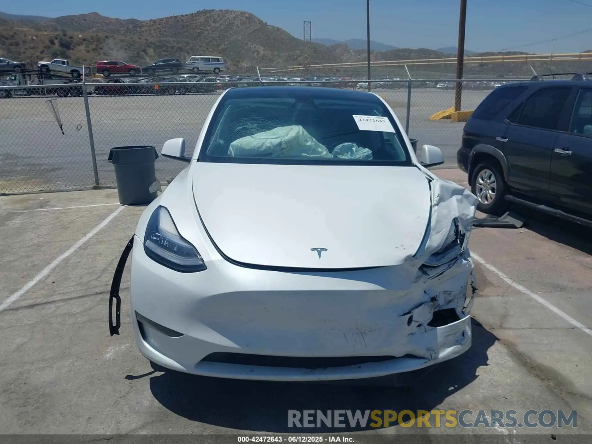 12 Photograph of a damaged car 7SAYGDEE6NF481300 TESLA MODEL Y 2022