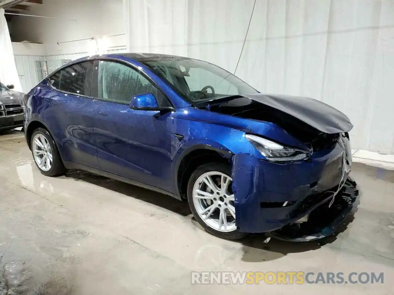 4 Photograph of a damaged car 7SAYGDEE7NA009684 TESLA MODEL Y 2022