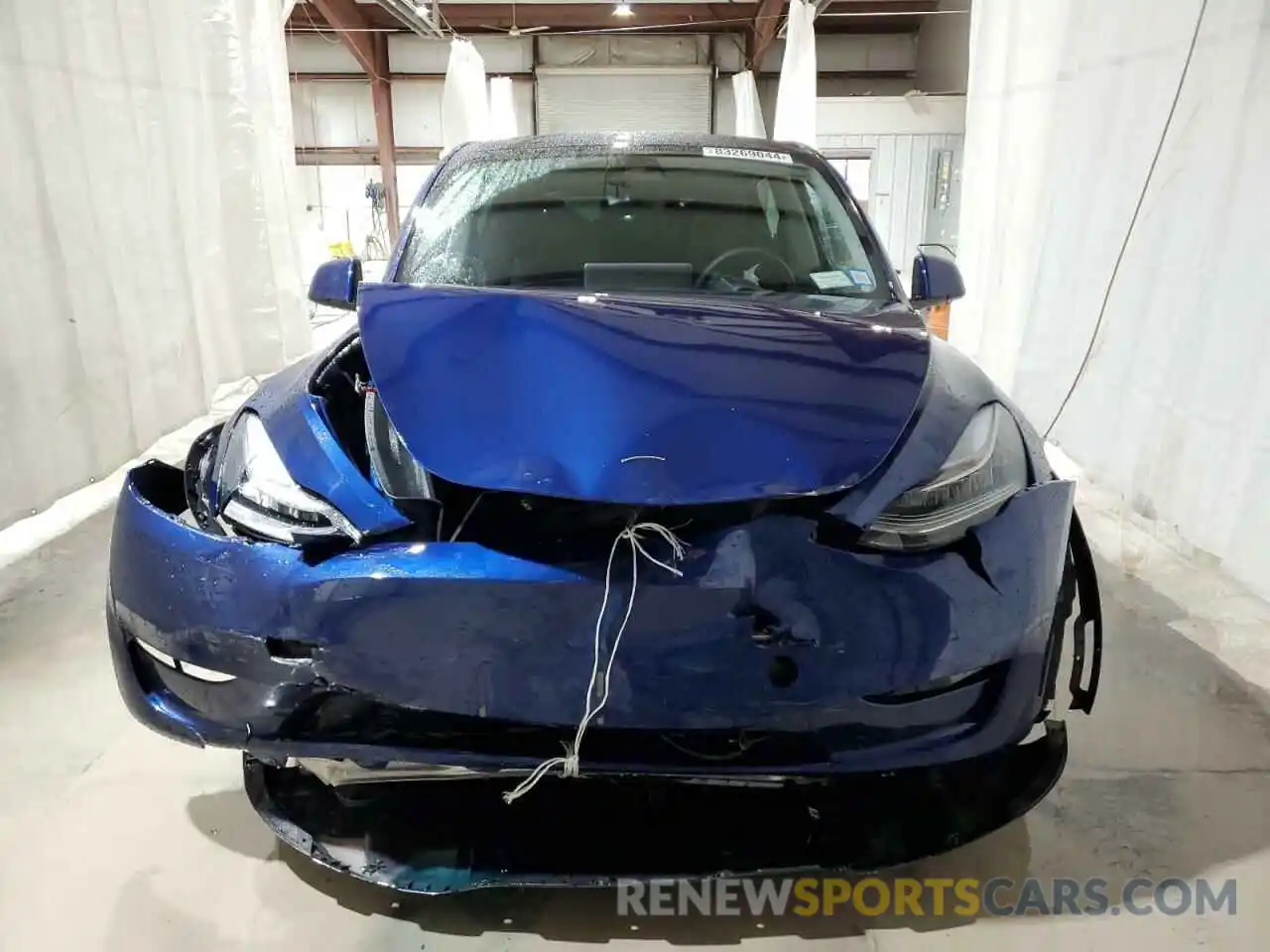 5 Photograph of a damaged car 7SAYGDEE7NA009684 TESLA MODEL Y 2022