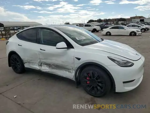 4 Photograph of a damaged car 7SAYGDEE7NA010463 TESLA MODEL Y 2022