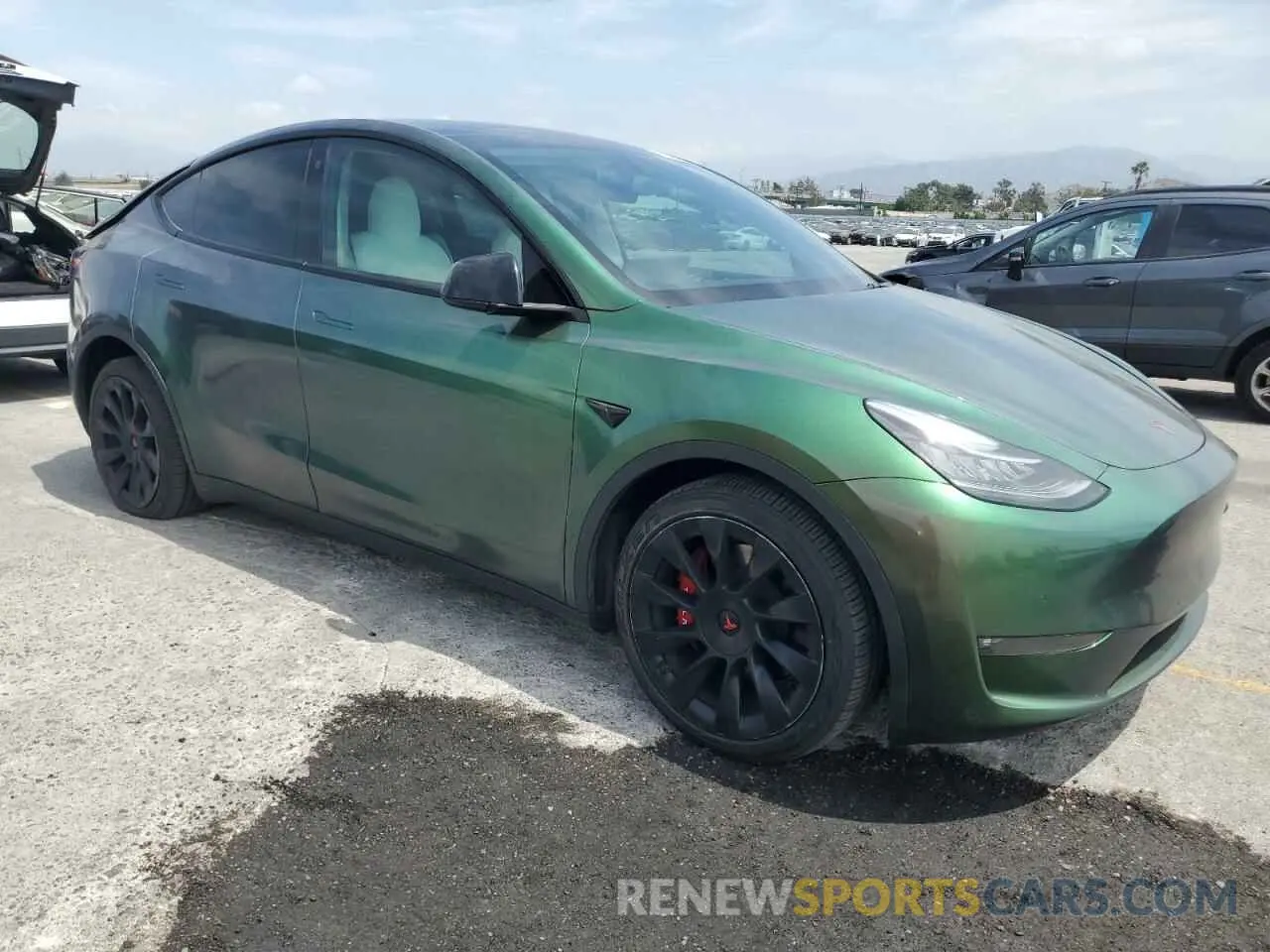 4 Photograph of a damaged car 7SAYGDEE7NF352000 TESLA MODEL Y 2022