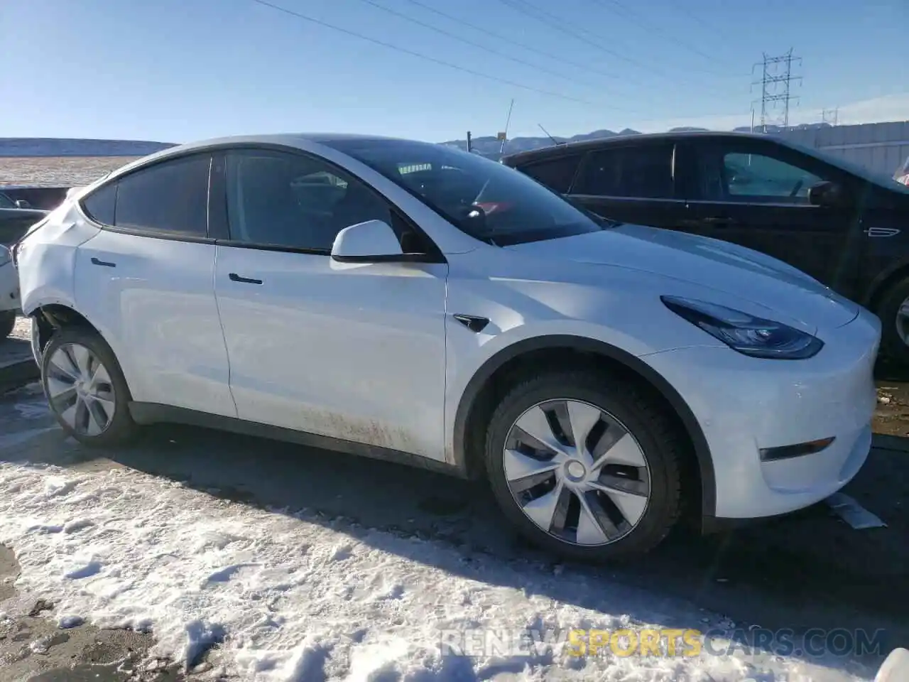 4 Photograph of a damaged car 7SAYGDEE9NA010187 TESLA MODEL Y 2022