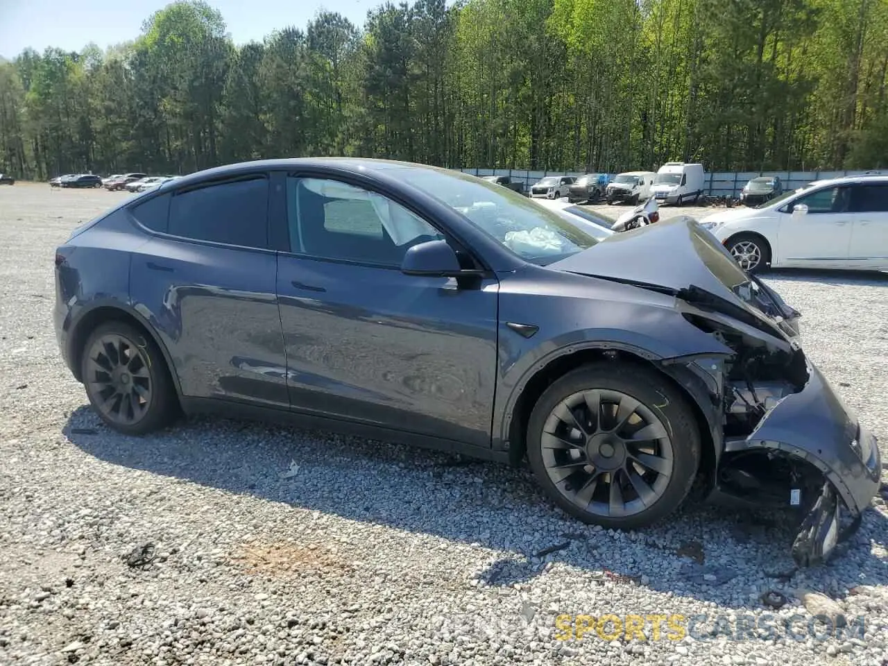 4 Photograph of a damaged car 7SAYGDEE9NA014319 TESLA MODEL Y 2022